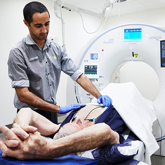 a patient undergoing PET/CT scan