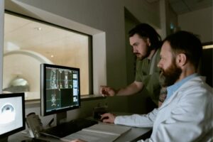 Photo of experts reviewing imaging