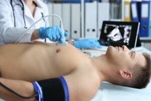 A patient undergoing cardiovascular nuclear medicine imaging