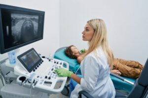 Doctor examining a patient through medical imaging