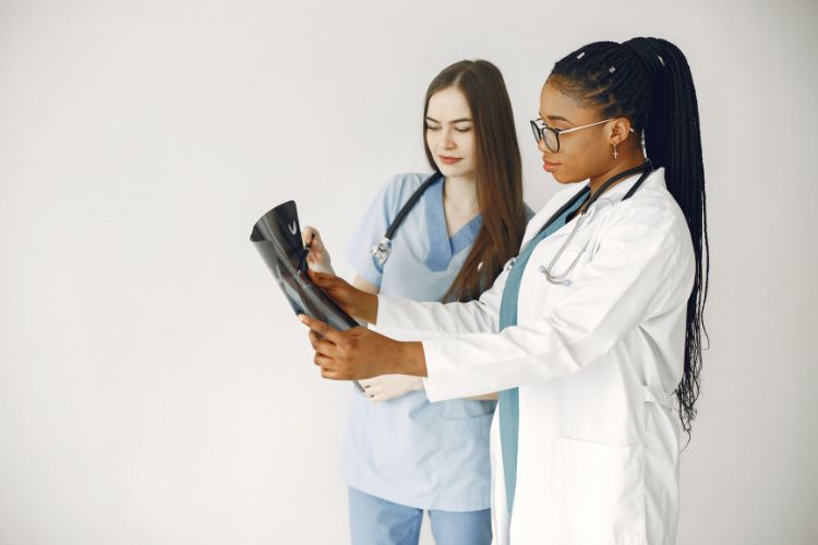 Experts reviewing X-ray